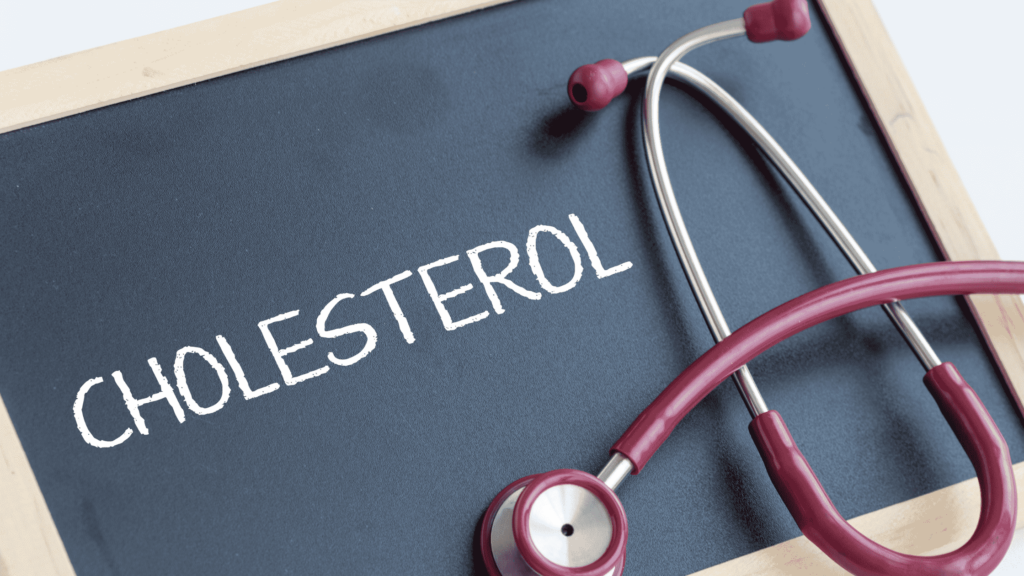 chalkboard with word 'cholesterol' and stethoscope